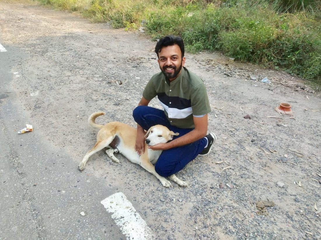 Anubhav caring for a rescued dog